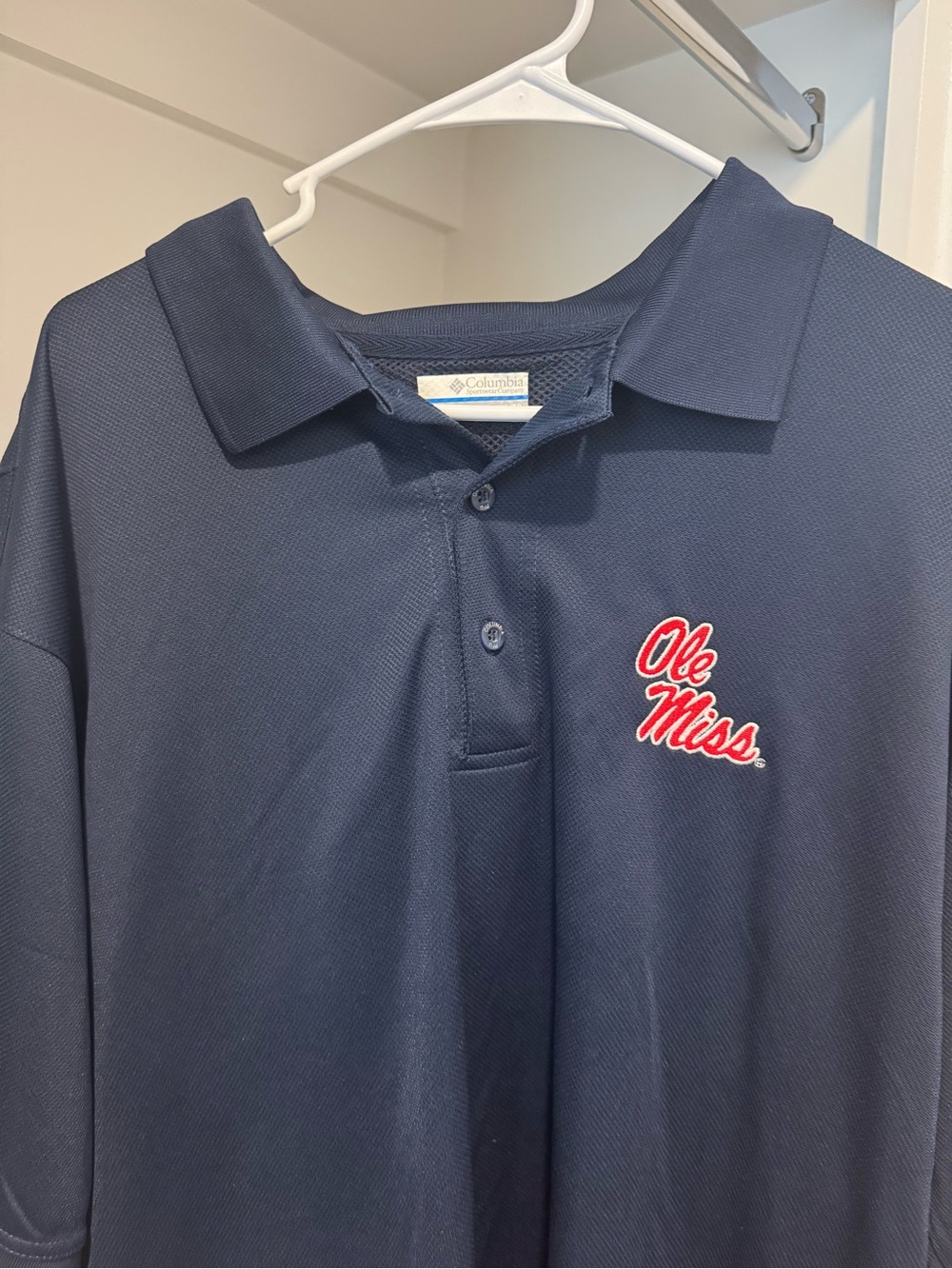 Columbia Navy Polo with Red Ole Miss Logo